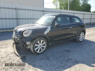 2015 MINI Paceman z VIN WMWSS1C51FWN95072, wystawiony jako Copart lot #52575495 z przebiegiem 88 635 mil mil oraz Szkoda całkowita • Salvage title. Historia ofert i sprzedaży dostępna na DreamBid. Obrazek 1.