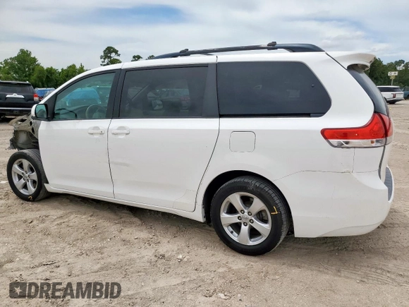 2014 Toyota Sienna LE AAS with VIN 5TDKK3DC1ES424249, listed as a Copart auction lot 62114525 with 193,301 mi miles and Salvage title. Bid and sale history available at DreamBid. Image 2.