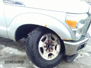 2012 Ford F-250 XL z VIN 1FT7X2B61CED13945, wystawiony jako IAAI lot #41662333 z przebiegiem 196 509 mil mil oraz . Historia ofert i sprzedaży dostępna na DreamBid. Obrazek 6.