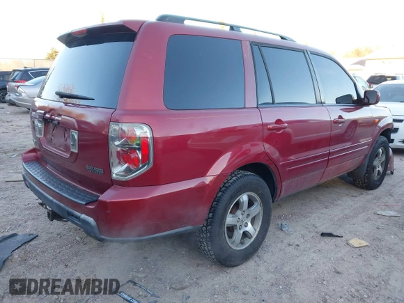 2006 Honda Pilot EX-L with VIN 5FNYF28586B005602, listed as a IAAI auction lot 41247326 with 221,698 mi miles and . Bid and sale history available at DreamBid. Image 4.