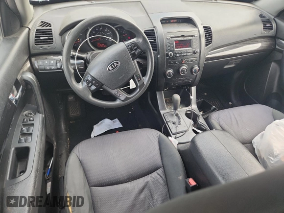2012 Kia Sorento LX z VIN 5XYKT4A67CG237867, wystawiony jako Copart lot #59290895 z przebiegiem 276 190 mil mil oraz Szkoda całkowita • Salvage title. Historia ofert i sprzedaży dostępna na DreamBid. Obrazek 8.