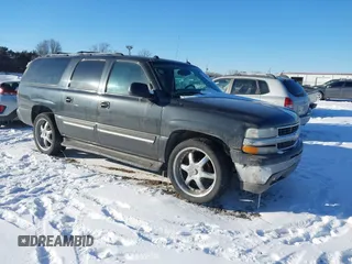 2004 Chevrolet Suburban LS with VIN 3GNEC16Z94G319009, listed as a IAAI auction lot 41531390 with 259,957 mi miles. Bid and sale history available at carsss.com. Image 1.