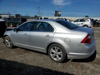 2012 Ford Fusion SE z VIN 3FAHP0HA8CR432289, wystawiony jako Copart lot #58714925 z przebiegiem 59 201 mil mil oraz Szkoda całkowita • Salvage title. Historia ofert i sprzedaży dostępna na DreamBid. Obrazek 2.