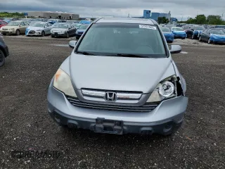 2007 Honda CR-V EX-L z VIN JHLRE48767C107065, wystawiony jako Copart lot #57261965 z przebiegiem 160 752 mil mil oraz Szkoda całkowita • Salvage title. Historia ofert i sprzedaży dostępna na DreamBid. Obrazek 5.