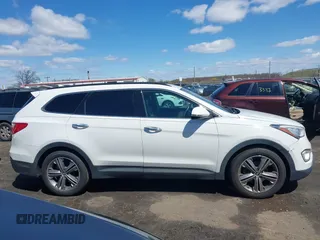 2014 Hyundai Santa Fe Limited z VIN KM8SNDHF8EU080086, wystawiony jako IAAI lot #41995020 z przebiegiem 168 532 mil mil oraz . Historia ofert i sprzedaży dostępna na DreamBid. Obrazek 13.
