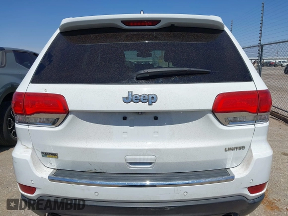 2014 Jeep Grand Cherokee Limited with VIN 1C4RJEBG6EC453833, listed as a IAAI auction lot 41901390 with 148,576 mi miles and . Bid and sale history available at DreamBid. Image 17.