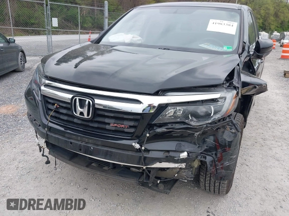 2019 Honda Ridgeline Sport with VIN 5FPYK3F10KB046552, listed as a IAAI auction lot 41983384 with 77,229 mi miles and . Bid and sale history available at DreamBid. Image 6.