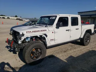 2021 Jeep Gladiator Rubicon with VIN 1C6JJTBGXML601702, listed as a Copart auction lot 64662123 with 18,079 mi miles. Bid and sale history available at carsss.com. Image 1.