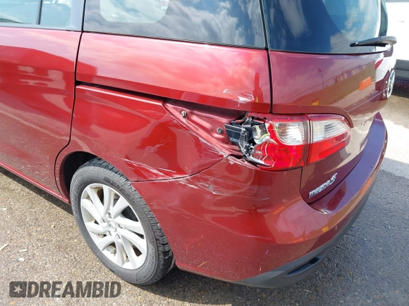 2012 Mazda 5 Sport with VIN JM1CW2BL9C0107471, listed as a IAAI auction lot 42021285 with 104,851 mi miles. Bid and sale history available at carsss.com. Image 6.