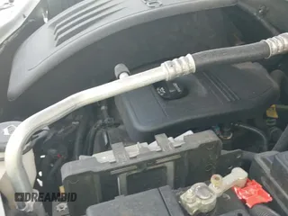 2014 Chevrolet Captiva Sport LS z VIN 3GNAL2EKXES673077, wystawiony jako IAAI lot #42392998 z przebiegiem 145 412 mil mil oraz . Historia ofert i sprzedaży dostępna na DreamBid. Obrazek 12.