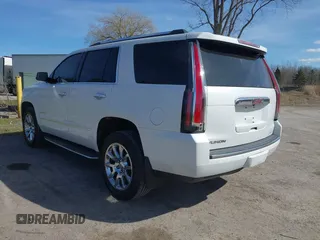 2017 GMC Yukon Denali with VIN 1GKS2CKJ4HR148397, listed as a IAAI auction lot 41942659 with 167,719 mi miles. Bid and sale history available at carsss.com. Image 3.