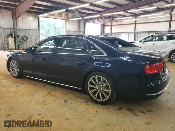 2011 Audi A8 z VIN WAURVAFD4BN005925, wystawiony jako Copart lot #56998325 z przebiegiem 147 449 mil mil oraz Tytuł czysty. Historia ofert i sprzedaży dostępna na DreamBid. Obrazek 2.