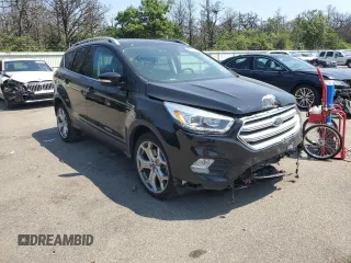 2018 Ford Escape Titanium with VIN 1FMCU9J97JUB94406, listed as a Copart auction lot 66663215 with 96,482 mi miles and Salvage title. Bid and sale history available at DreamBid. Image 4.