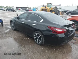 2018 Nissan Altima 2.5 SR with VIN 1N4AL3AP1JC131386, listed as a IAAI auction lot 41895828 with 58,912 mi miles. Bid and sale history available at carsss.com. Image 3.