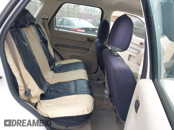 2009 Ford Escape XLS with VIN 1FMCU927X9KC79986, listed as a IAAI auction lot 41936917 with 208,816 mi miles and . Bid and sale history available at DreamBid. Image 8.