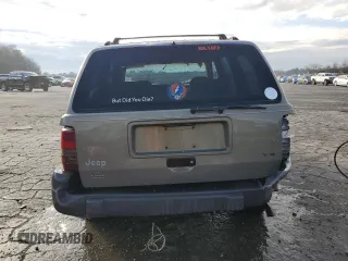1996 Jeep Grand Cherokee with VIN 1J4EZ58S9TC148692, listed as a Copart auction lot 87730075 with Not provided miles and Salvage title. Bid and sale history available at DreamBid. Image 6.