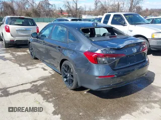 2022 Honda Civic Sport z VIN 2HGFE2F55NH587553, wystawiony jako IAAI lot #41816927 z przebiegiem 31 016 mil mil oraz . Historia ofert i sprzedaży dostępna na DreamBid. Obrazek 3.