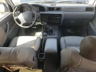 1995 Toyota Land Cruiser z VIN JT3DJ81W9S0112464, wystawiony jako Copart lot #49925395 z przebiegiem 215 698 mil mil oraz Czysty tytuł • Clean title. Historia ofert i sprzedaży dostępna na DreamBid. Obrazek 8.