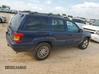 2004 Jeep Grand Cherokee with VIN 1J8GX58J54C121513, listed as a Copart auction lot 59384005 with 221,397 mi miles and Salvage title. Bid and sale history available at DreamBid. Image 3.