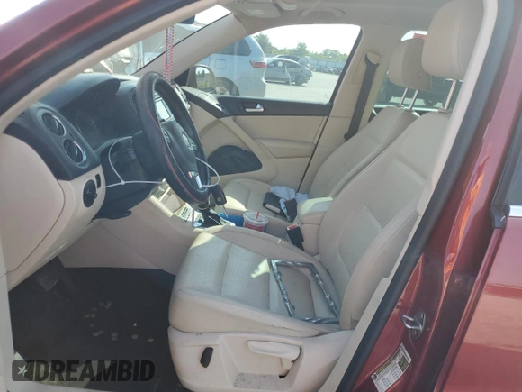 2012 Volkswagen Tiguan SE with VIN WVGAV7AX9CW003857, listed as a Copart auction lot 58356295 with 202,794 mi miles and Salvage title. Bid and sale history available at DreamBid. Image 7.