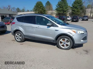 2015 Ford Escape SE with VIN 1FMCU9GX8FUA01774, listed as a IAAI auction lot 42105808 with 119,847 mi miles. Bid and sale history available at carsss.com. Image 6.