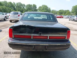1997 Lincoln Town Car Executive z VIN 1LNLM81W4VY743851, wystawiony jako IAAI lot #42391178 z przebiegiem 261 762 mil mil oraz . Historia ofert i sprzedaży dostępna na DreamBid. Obrazek 6.