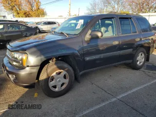 2003 Chevrolet TrailBlazer LT with VIN 1GNDS13S632226297, listed as a Copart auction lot 82041934 with 114,490 mi miles and Salvage Title. Bid and sale history available at DreamBid. Image 1.