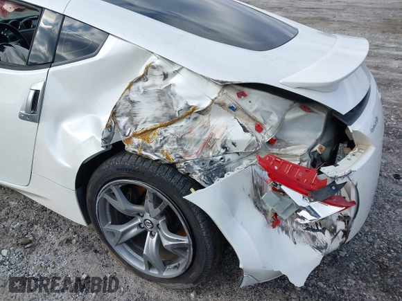 2012 Nissan 370Z Touring with VIN JN1AZ4EH4CM565125, listed as a IAAI auction lot 41630602 with 121,823 mi miles. Bid and sale history available at carsss.com. Image 6.