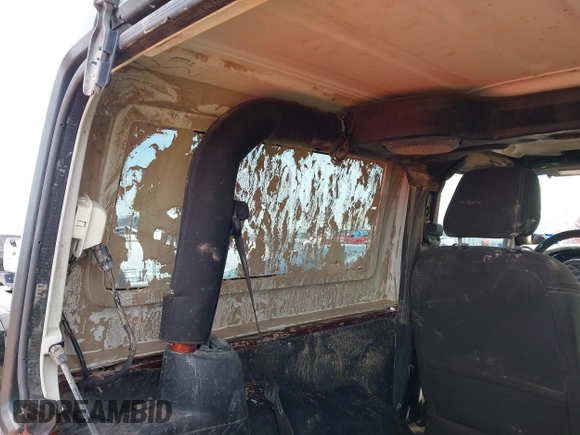 2014 Jeep Wrangler Rubicon with VIN 1C4BJWCG8EL185597, listed as a IAAI auction lot 41914489 with 85,545 mi miles and . Bid and sale history available at DreamBid. Image 6.