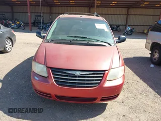 2006 Chrysler Town & Country SWB with VIN 1A4GP45R76B572053, listed as a IAAI auction lot 42015562 with 310,509 mi miles. Bid and sale history available at carsss.com. Image 6.