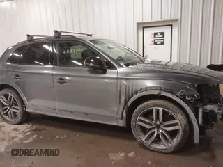2019 Audi SQ5 Premium Plus z VIN WA1B4AFY1K2097033, wystawiony jako IAAI lot #41433068 z przebiegiem 47 730 mil mil oraz . Historia ofert i sprzedaży dostępna na DreamBid. Obrazek 14.