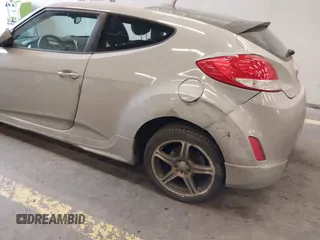 2013 Hyundai Veloster w/Black Int with VIN KMHTC6AD2DU128534, listed as a IAAI auction lot 41791398 with 158,414 mi miles and . Bid and sale history available at DreamBid. Image 6.