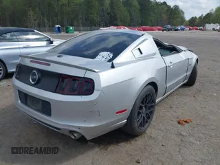 2013 Ford Mustang GT with VIN 1ZVBP8CFXD5233165, listed as a IAAI auction lot 41913971 with 181,914 mi miles. Bid and sale history available at carsss.com. Image 4.
