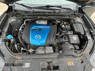 2013 Mazda CX-5 Sport with VIN JM3KE4BE7D0141588, listed as a Copart auction lot 66138585 with 124,920 mi miles and Clean title. Bid and sale history available at DreamBid. Image 7.