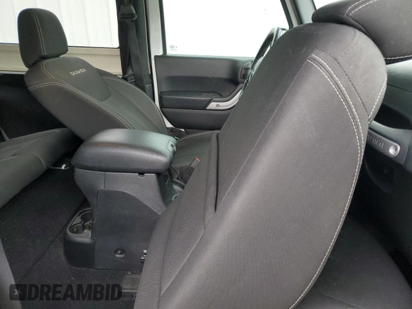 2016 Jeep Wrangler Sahara with VIN 1C4AJWBG5GL157885, listed as a Copart auction lot 51100655 with 73,090 mi miles and Salvage title. Bid and sale history available at DreamBid. Image 11.