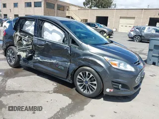 2017 Ford C-Max Titanium z VIN 1FADP5FU9HL103731, wystawiony jako IAAI lot #42244091 z przebiegiem 50 292 mil mil oraz . Historia ofert i sprzedaży dostępna na DreamBid. Obrazek 1.