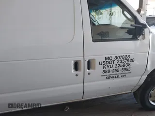 2011 Ford Econoline Cargo Commercial with VIN 1FTNE2EW6BDB06514, listed as a IAAI auction lot 42177011 with 336,946 mi miles. Bid and sale history available at carsss.com. Image 13.