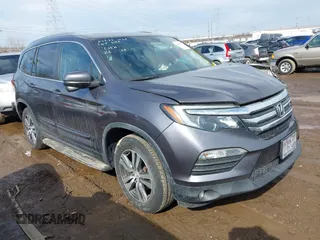 2017 Honda Pilot EX-L with VIN 5FNYF5H53HB029780, listed as a IAAI auction lot 41667838 with 104,803 mi miles. Bid and sale history available at carsss.com. Image 1.