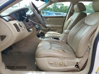 2006 Cadillac DTS 1SC z VIN 1G6KD57Y26U177384, wystawiony jako Copart lot #58200665 z przebiegiem 122 356 mil mil oraz Szkoda całkowita • Salvage title. Historia ofert i sprzedaży dostępna na DreamBid. Obrazek 7.