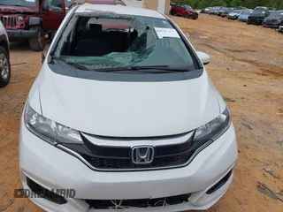 2019 Honda Fit LX z VIN 3HGGK5H4XKM704303, wystawiony jako IAAI lot #42019753 z przebiegiem 137 271 mil mil oraz . Historia ofert i sprzedaży dostępna na DreamBid. Obrazek 12.