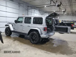 2021 Jeep Wrangler Unlimited Sahara Altitude with VIN 1C4HJXEN1MW692690, listed as a Copart auction lot 84927014 with 34,268 mi miles and Salvage title. Bid and sale history available at DreamBid. Image 2.