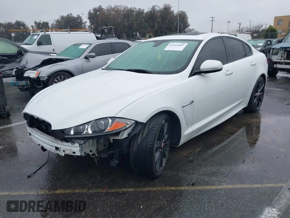 2015 Jaguar XF V6 Portfolio with VIN SAJWA0F70F8U62534, listed as a IAAI auction lot 41521097 with 112,117 mi miles. Bid and sale history available at carsss.com. Image 2.