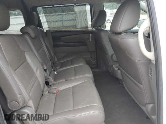2013 Honda Odyssey EX-L with VIN 5FNRL5H62DB048370, listed as a Copart auction lot 63013465 with 129,552 mi miles and Salvage title. Bid and sale history available at DreamBid. Image 11.