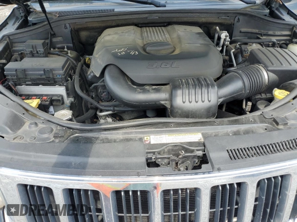 2011 Jeep Grand Cherokee Laredo with VIN 1J4RR4GG6BC538074, listed as a Copart auction lot 60231465 with 203,942 mi miles and Salvage title. Bid and sale history available at DreamBid. Image 11.