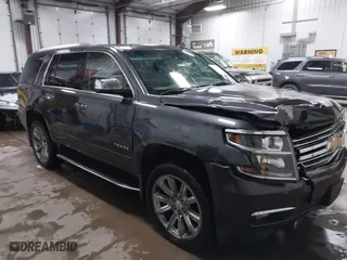 2016 Chevrolet Tahoe LTZ with VIN 1GNSKCKC7GR455033, listed as a IAAI auction lot 40811560 with 165,845 mi miles. Bid and sale history available at carsss.com. Image 1.