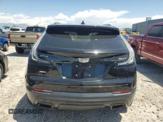 2019 Cadillac XT4 AWD Sport z VIN 1GYFZFR47KF152344, wystawiony jako Copart lot #57535655 z przebiegiem 70 107 mil mil oraz Szkody całkowita. Historia ofert i sprzedaży dostępna na DreamBid. Obrazek 6.
