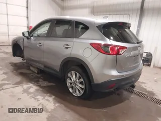 2015 Mazda CX-5 Grand Touring with VIN JM3KE4DY2F0477966, listed as a IAAI auction lot 41247178 with 116,582 mi miles. Bid and sale history available at carsss.com. Image 3.