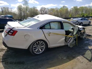 2016 Ford Taurus Limited z VIN 1FAHP2F86GG104703, wystawiony jako Copart lot #52086535 z przebiegiem Nie podano mil oraz Szkoda całkowita • Salvage title. Historia ofert i sprzedaży dostępna na DreamBid. Obrazek 3.