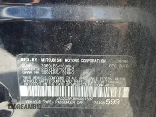 2017 Mitsubishi Lancer ES z VIN JA32U2FU6HU007637, wystawiony jako Copart lot #56843245 z przebiegiem 119 915 mil mil oraz Szkoda całkowita • Salvage title. Historia ofert i sprzedaży dostępna na DreamBid. Obrazek 13.