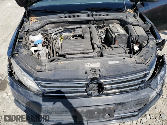 2017 Volkswagen Jetta S z VIN 3VW2B7AJXHM319558, wystawiony jako Copart lot #54708105 z przebiegiem 108 476 mil mil oraz Czysty tytuł • Clean title. Historia ofert i sprzedaży dostępna na DreamBid. Obrazek 11.